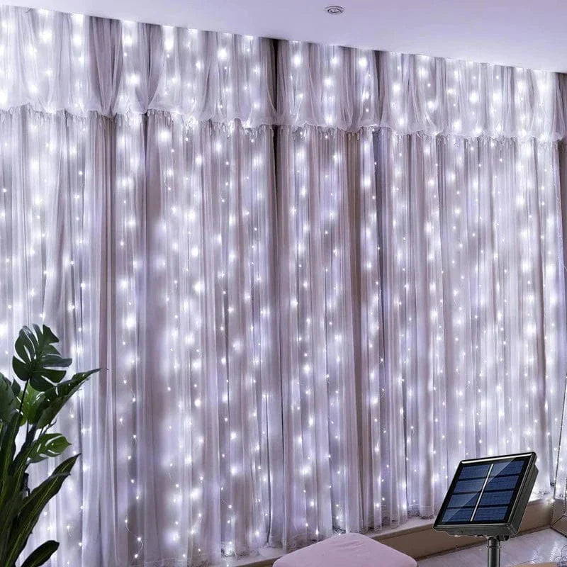 "Solar LED curtain light with copper wire, ideal for events, featuring warm white LEDs and solar power, outdoor use."