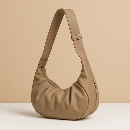 Spacious puffer crossbody bag for women with water-resistant finish, thick shoulder strap, and roomy interior—ideal for travel and everyday use.