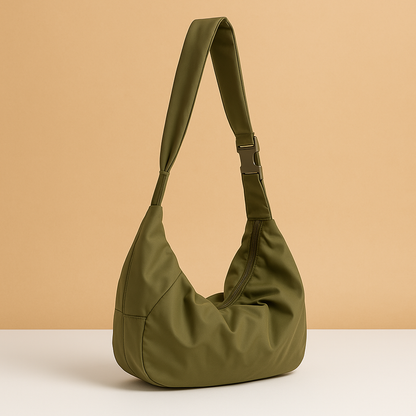 Spacious puffer crossbody bag for women with water-resistant finish, thick shoulder strap, and roomy interior—ideal for travel and everyday use.