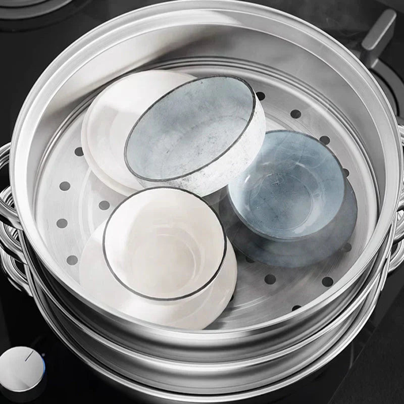 "Stainless steel 3-tier steamer with glass lid and handles, ideal for healthy cooking, steaming vegetables, fish, and dumplin