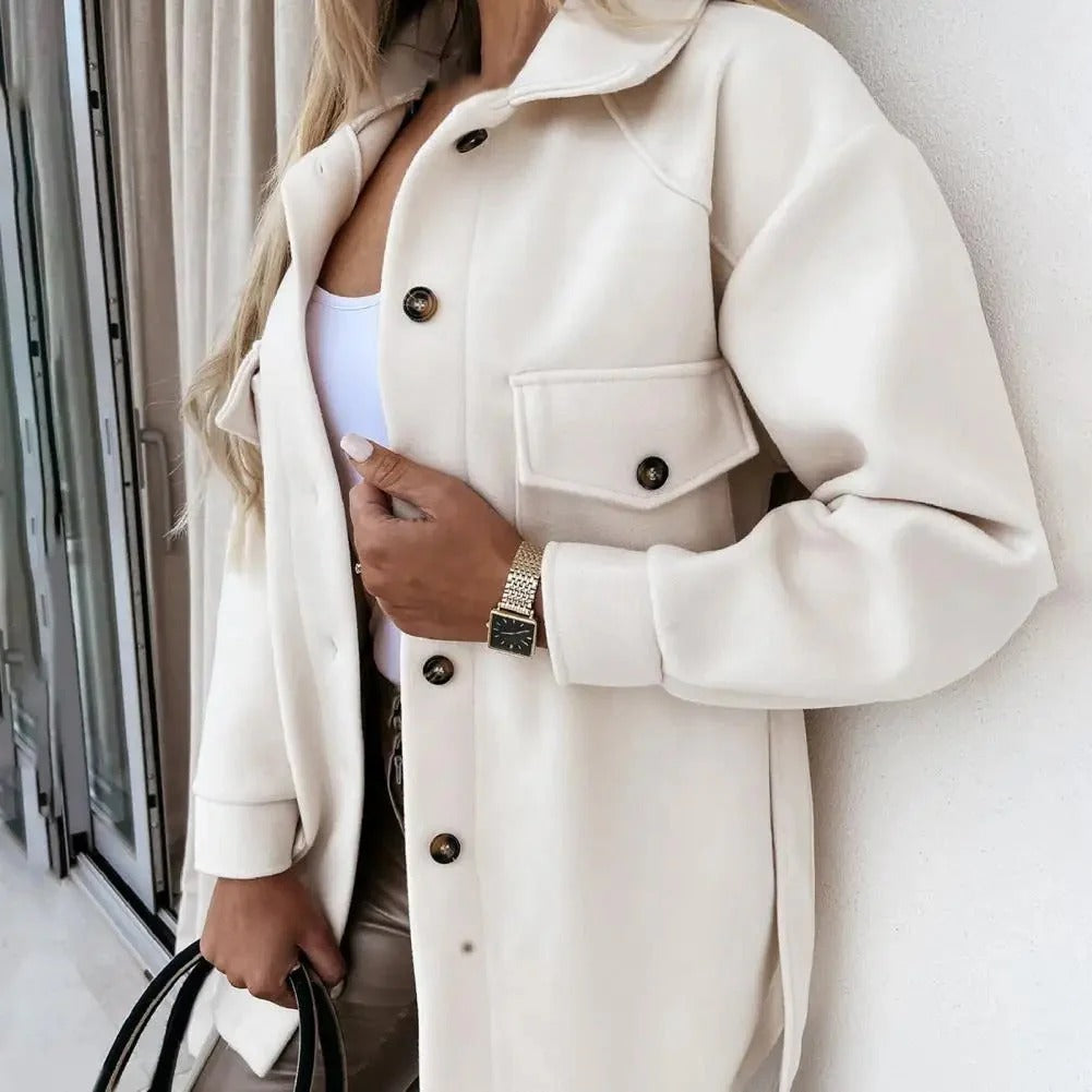 "Stylish women's mid-season jacket with slim fit, zip closure, in spring shades enhancing a chic and modern silhouette."