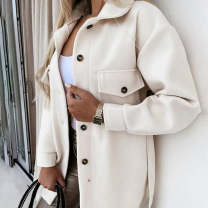 "Stylish women's mid-season jacket with slim fit, zip closure, in spring shades enhancing a chic and modern silhouette."