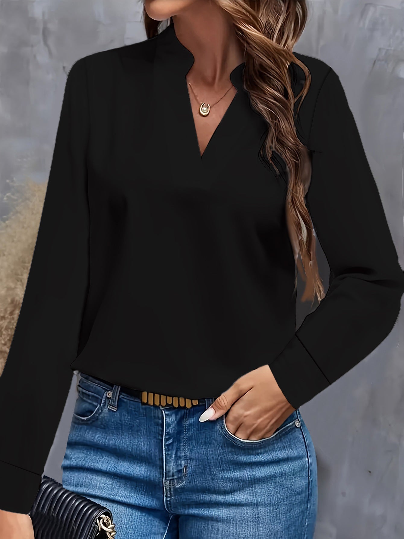 "Stylish women's V-neck blouse, light flowy fit, flattering silhouette, versatile for casual or formal occasions."