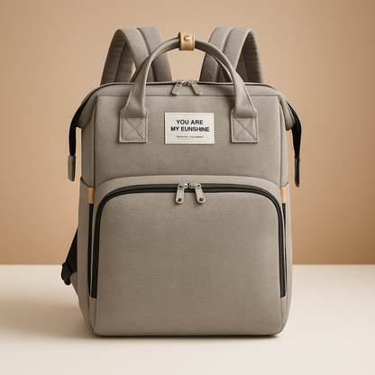 Travel diaper backpack for women featuring a portable crib, changing station, insulated baby bottle compartment, and dedicated storage pockets for easy organization.