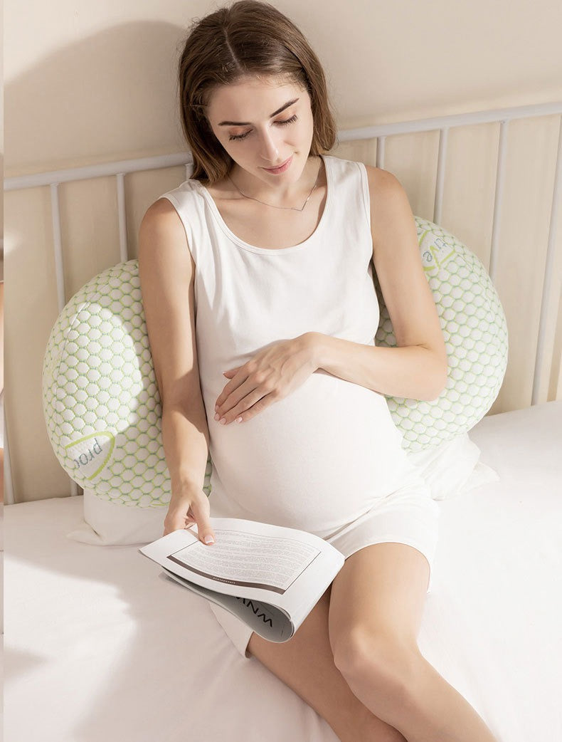 "U-shaped maternity pillow for pregnancy support, soft ergonomic design, offers full body comfort for back, belly, and legs."