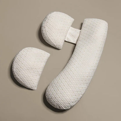 U-Shaped maternity pillow in white, offers full-body support for head, neck, back, belly, and legs with hypoallergenic fabric
