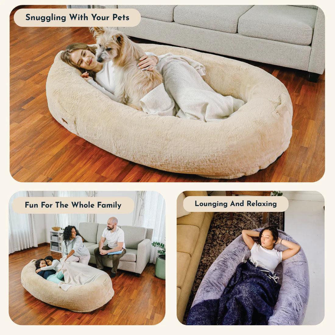 "Ultra-comfy plush lounger for pets and humans, oversized with plush pillow bolsters, dual-layer memory foam, stylish design.