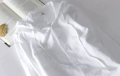 Unisex hooded shirt in lightweight fabric, showcasing breathable material and casual design with versatile unisex fit.