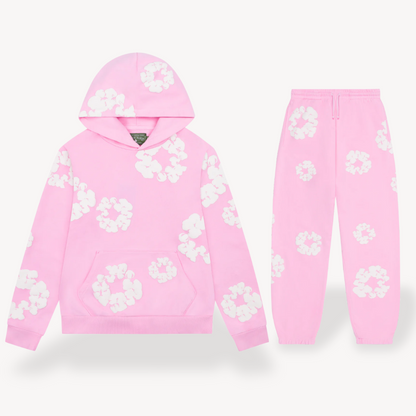Unisex hoodie with bold white floral graphics on black cotton, combines style and comfort for a standout look.