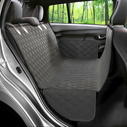 "Universal waterproof pet car seat cover with memory foam, plush and durable, fits any car for pet comfort and protection."
