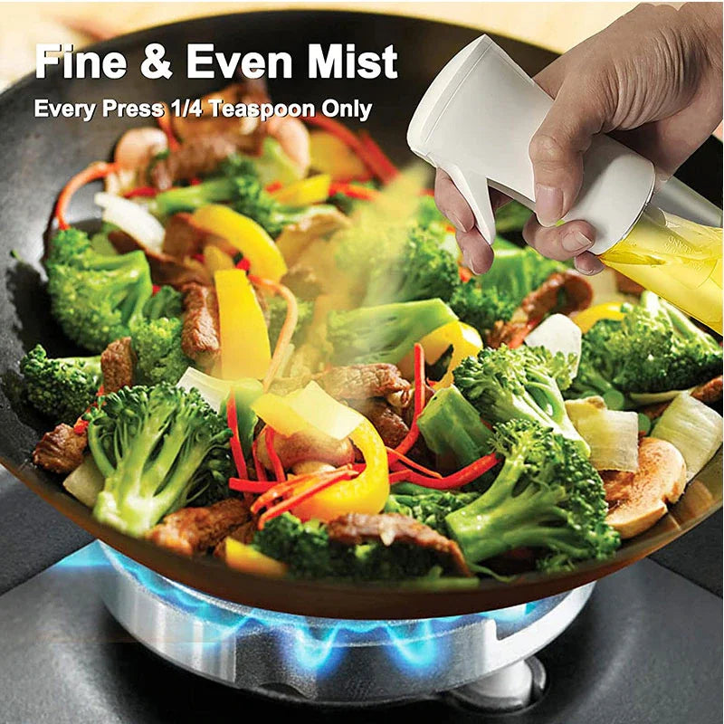 "Versatile refillable oil spray bottle, transparent body, fine mist spray, eco-friendly plastic, ideal for home chefs and coo