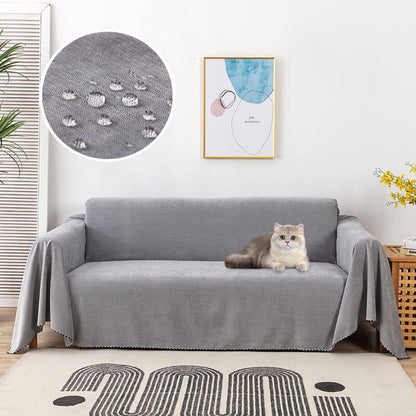Waterproof sofa throw with jacquard edge, non-slip design, corduroy, and polyester material, protects against spills.