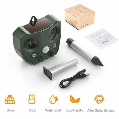 "Weatherproof solar ultrasonic animal repeller in garden, motion-activated to deter pests like cats and rodents."