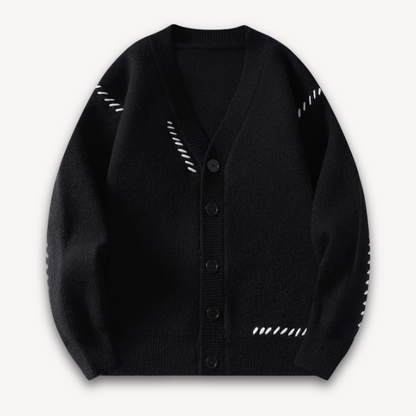 "White men's wool cardigan sweater with button-up front, ribbed cuffs, and black stitch detail for stylish winter wear."