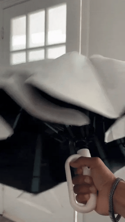 "Windproof automatic folding umbrella with reflective strip, featuring 10-rib construction, reverse folding, and carabiner ha