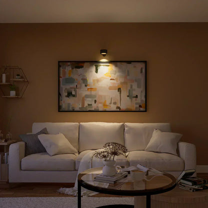Wireless LED wall light, stick-on, black and white, cordless, for indoor and outdoor use, emits warm white glow, energy-effic