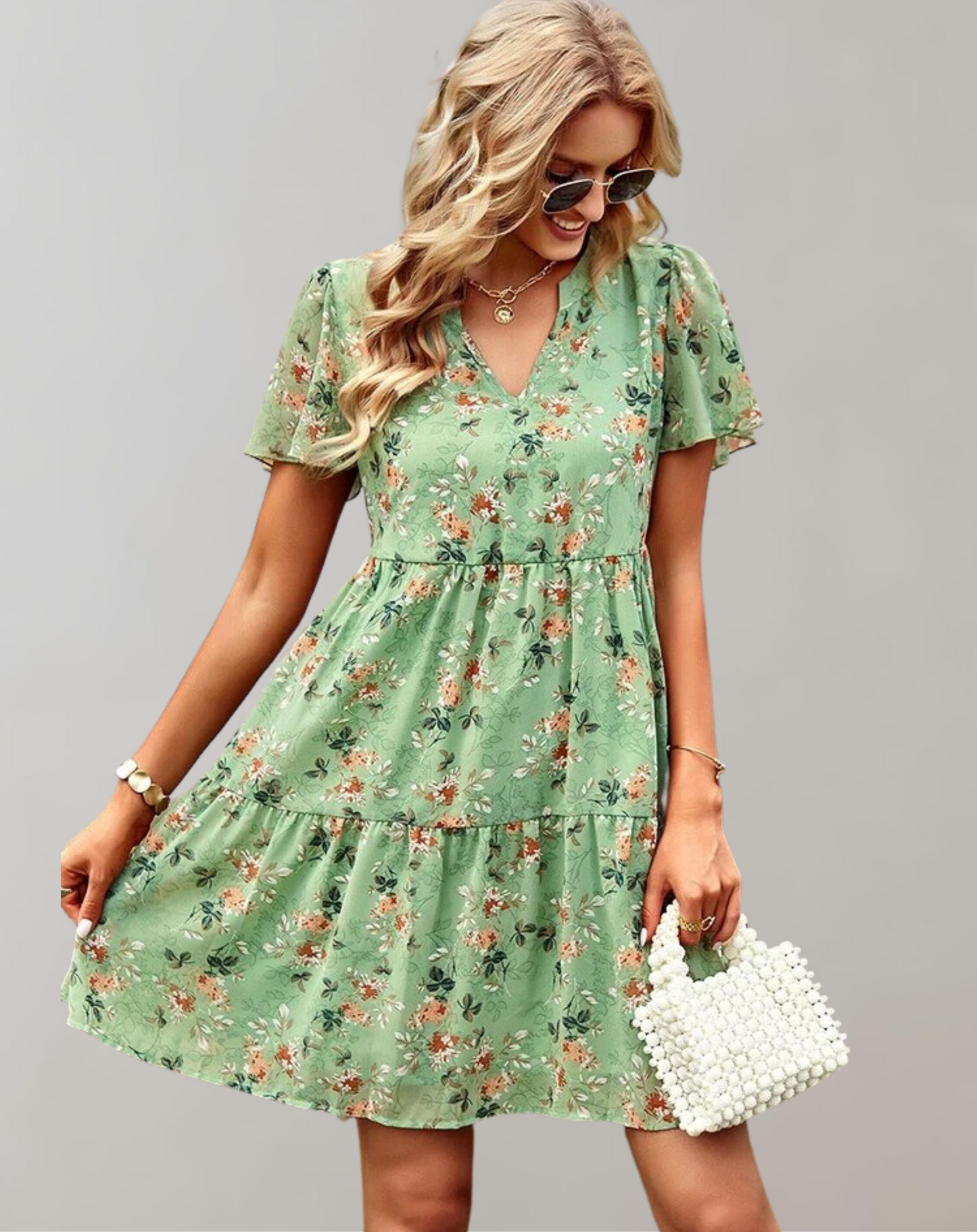 Women's casual V-neck floral midi dress, vibrant spring/summer print, loose fit, versatile style, sleeveless option