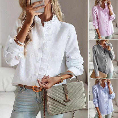 Women's clover long-sleeve blouse with ruffled design, elegant and versatile top for casual or formal occasions.