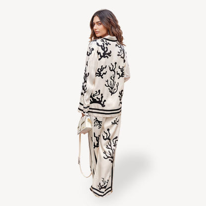 "Womens coral print pajama set, off-white with black coral patterns, long-sleeve top, elegant and stylish sleepwear."