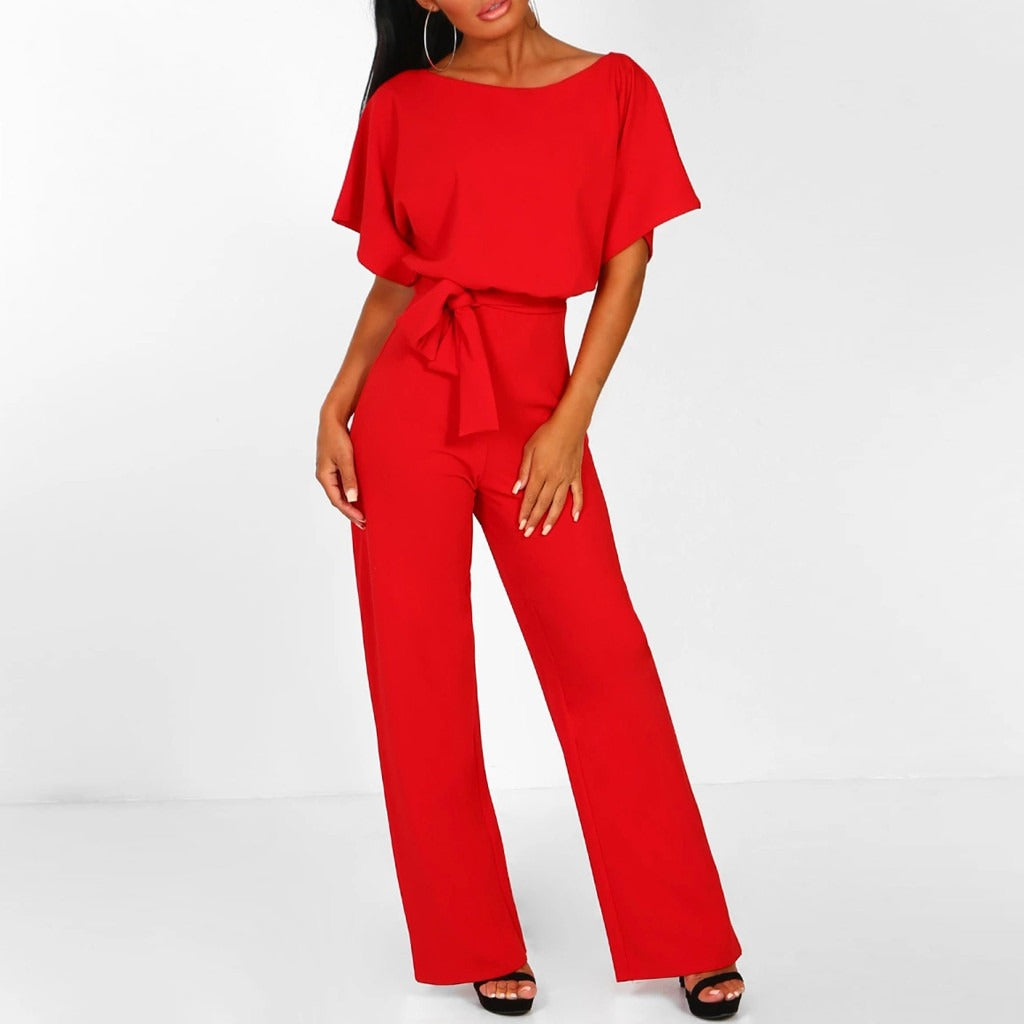 "Women's elegant belted jumpsuit, available in beige, black, blue. Features sleek design, versatile for any occasion."