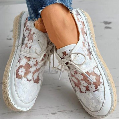 "Women's embroidered lace sneakers with floral mesh design, airy and elegant, featuring cushioned insoles for comfort."