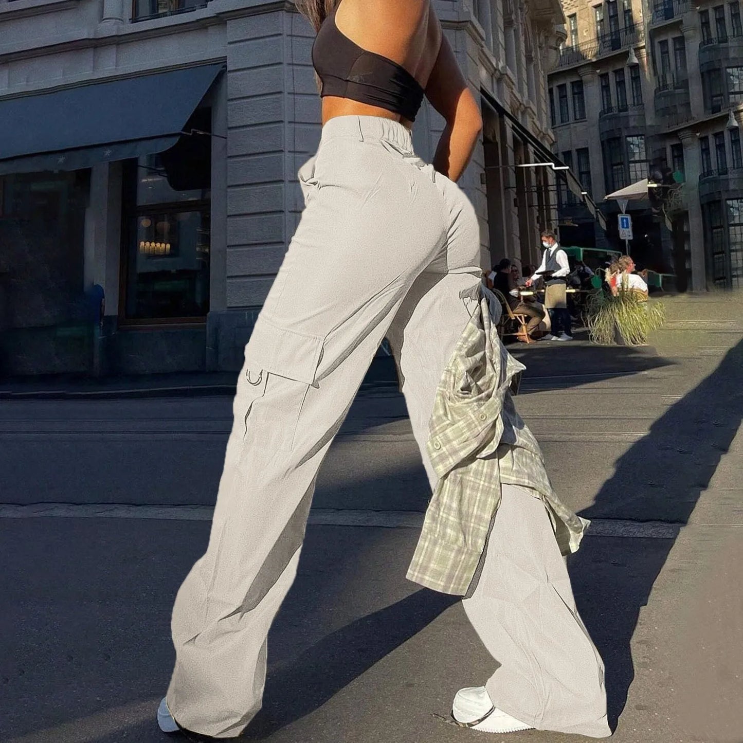 Women's high-waist cargo pants with functional pockets, showcasing durable fabric and versatile design for casual comfort.