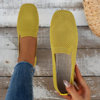 "Women's knit slip-on flats with square toe, breathable knit upper, and cushioned insole, side view."