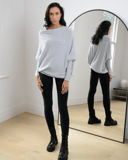 "Womens loose sweater with classic design, luxurious fit; available in beige, gray, black, green, purple, and more colors."