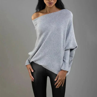 "Womens loose sweater with classic design, luxurious fit; available in beige, gray, black, green, purple, and more colors."
