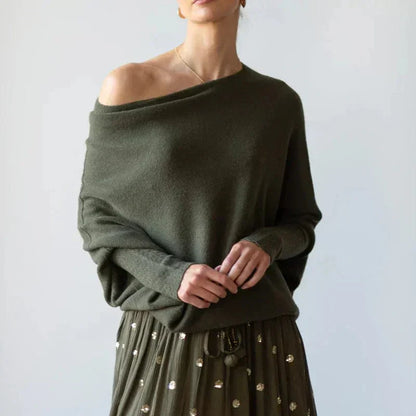 "Womens loose sweater with classic design, luxurious fit; available in beige, gray, black, green, purple, and more colors."