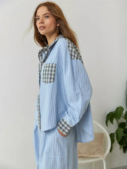 "Women's pink pajama set with elegant details, luxurious softness, and a relaxed fit, perfect for sleep and lounge."