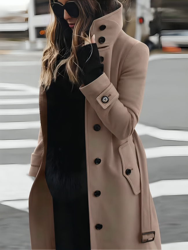 Women's slim-fit wool winter coat with long sleeves, showcasing sleek design; ideal for casual and formal settings.