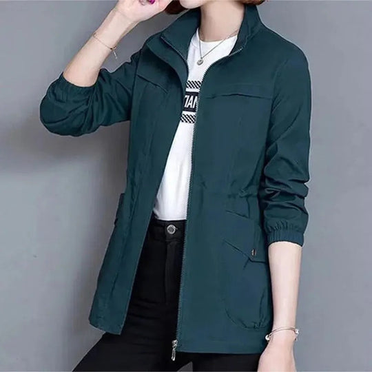 Women's spring trench coat, khaki, mid-length, with adjustable waist and button-down closure, perfect for breezy days.