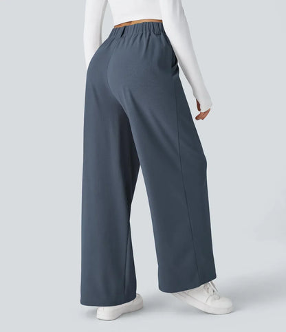 Women's stretch trousers, black, smooth fabric, tailored fit, flexible style, ideal for casual to formal outfits.