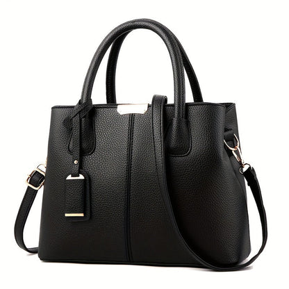 Women's stylish leather handbag with tote design, detachable crossbody strap, gold accents, spacious interior, elegant look.