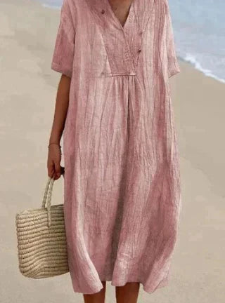 Women's V-Neck Relaxed Midi Dress in light, breathable fabric, featuring a flattering silhouette and perfect for warm weather