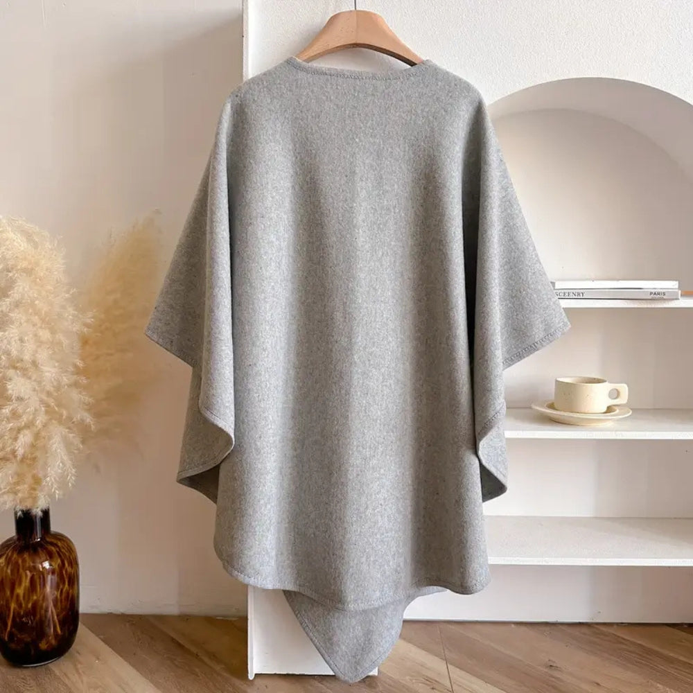 "Women's windproof poncho shawl coat with flowing silhouette in solid color, open front, perfect for fall and winter outfits.